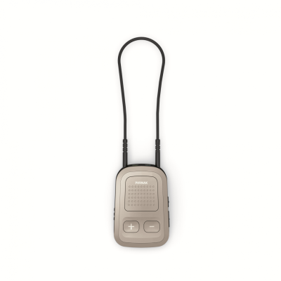A small, rectangular beige Phonak ComPilot II with a black neck loop is shown centered on a white background. It has a speaker, two large plus and minus volume buttons, and a square button below. The device is labeled "Phonak.