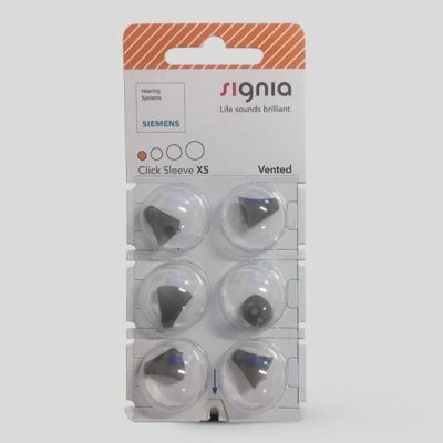 Six Signia Click Sleeve (Vented) XS ear tips in black are shown in a clear blister pack labeled “Signia Click Sleeve XS,” with Siemens branding and the tagline “Life sounds brilliant.”.