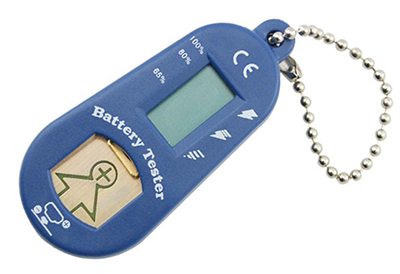 The Hearing Aid Battery Tester is a blue handheld device with a small digital display, labeled battery levels, icons, a keychain attachment, and a window showing battery polarity symbols.